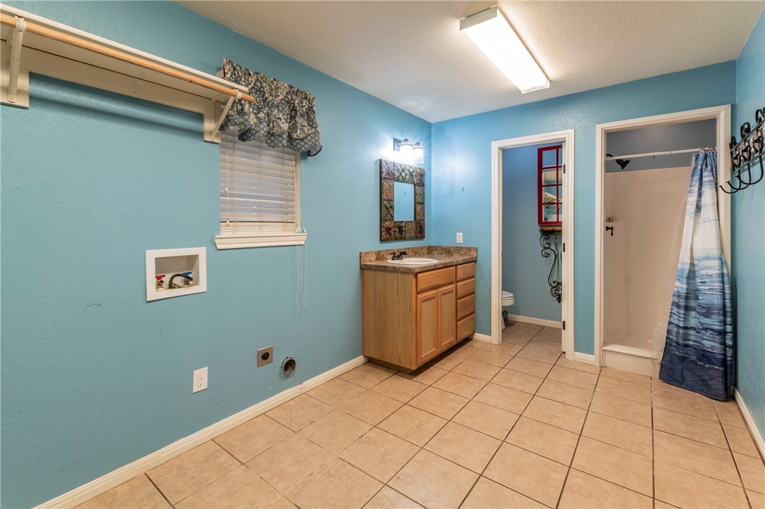1203 Ave B Waco, TX 76705 - Photo 24 of 32 a view of a kitchen with utility area