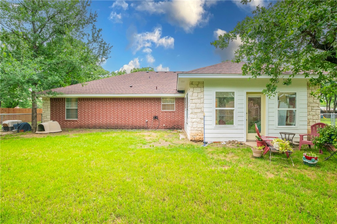 1203 Ave B Waco, TX 76705 - Photo 29 of 32 a front view of a house with garden