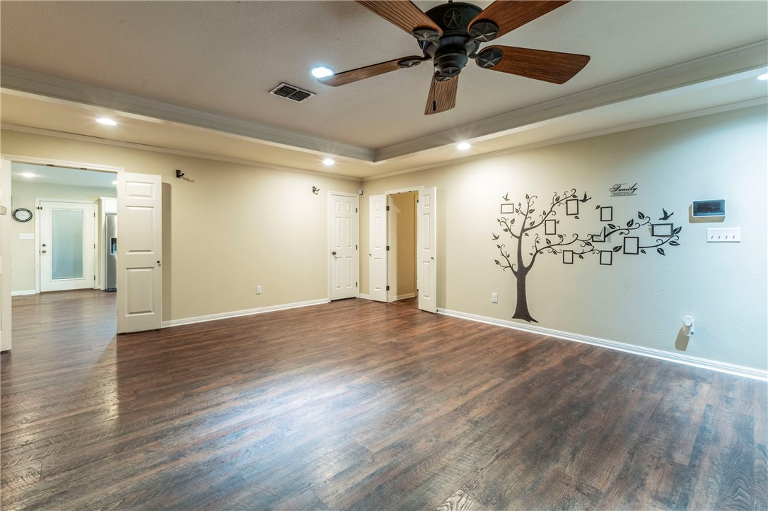 1203 Ave B Waco, TX 76705 - Photo 4 of 32 a view of empty room with wooden floor