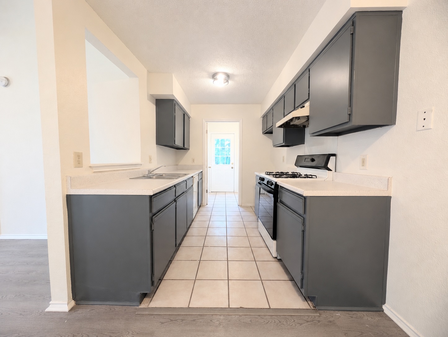 2016 Redwing Way Round Rock, TX 78664 - Photo 6 of 19 Functional kitchen with ample cabinet space, ready for culinary creations.