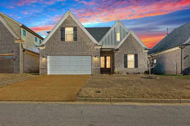 a view of a house with a street