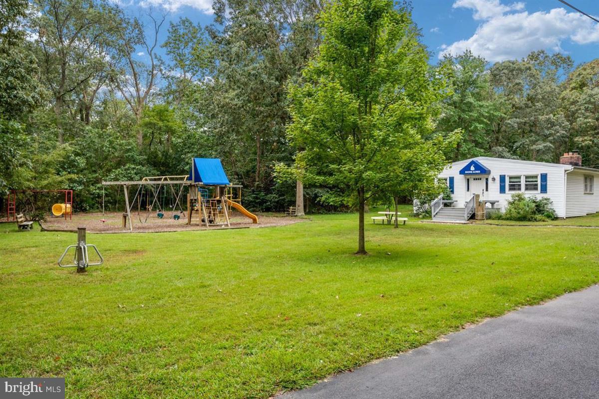 976 Shore Acres Road Arnold, MD 21012 - Photo 35 of 40 a front view of a house with a yard