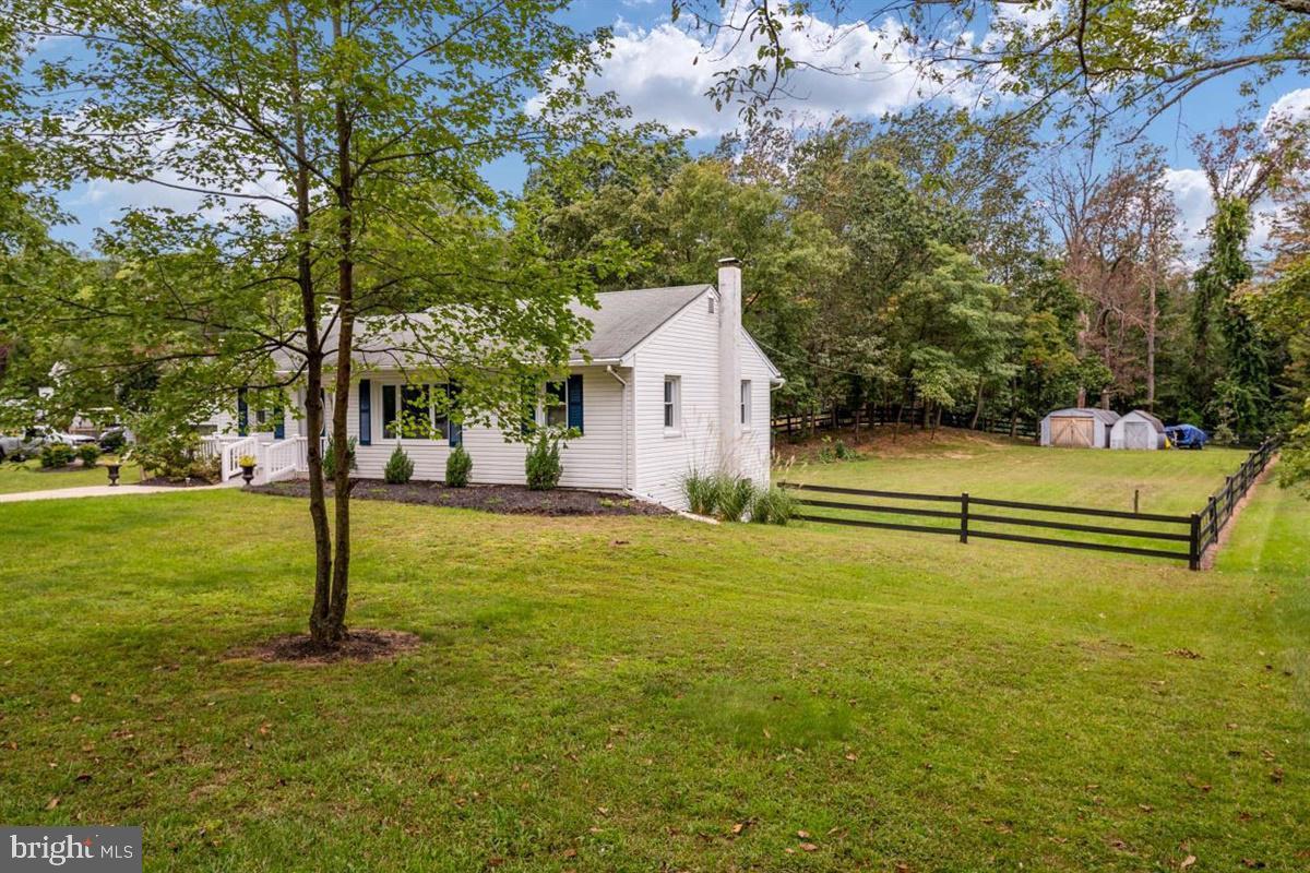976 Shore Acres Road Arnold, MD 21012 - Photo 5 of 40 a view of a house with a yard