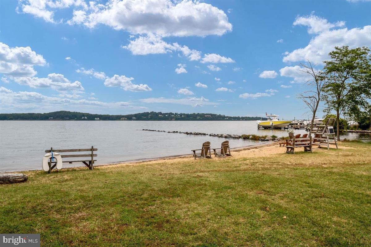 976 Shore Acres Road Arnold, MD 21012 - Photo 8 of 40 a view of a lake with outdoor seating