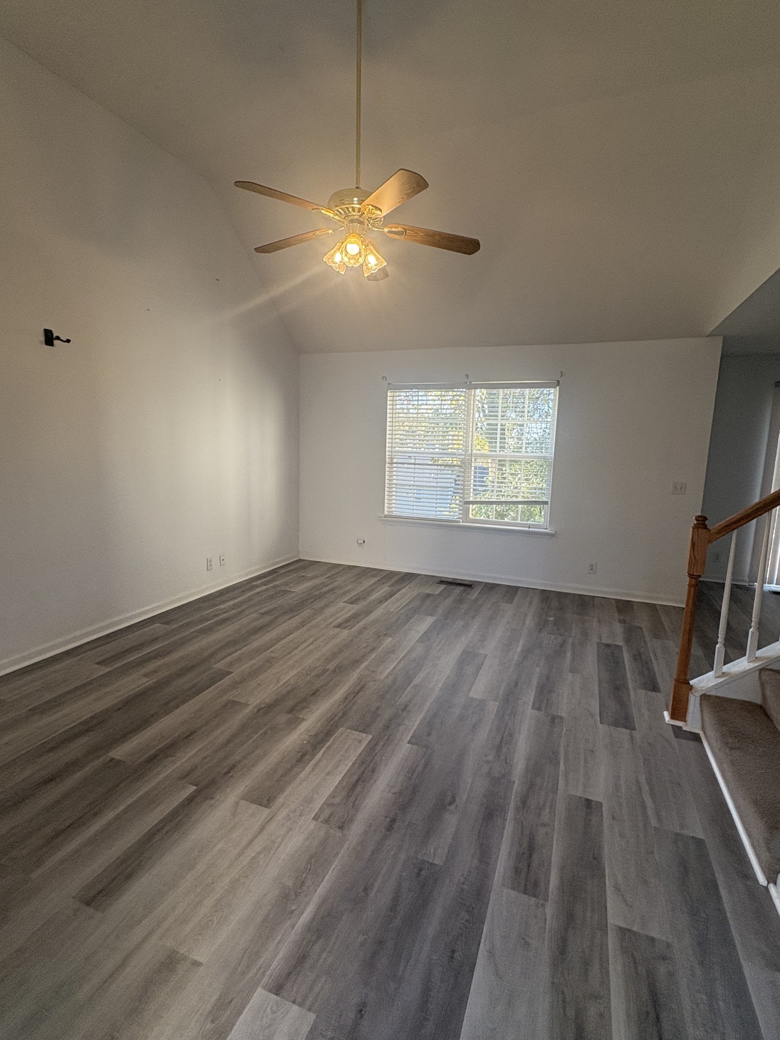 7165 Legacy Drive Antioch, TN 37013 - Photo 3 of 14 wooden floor in an empty room with a window