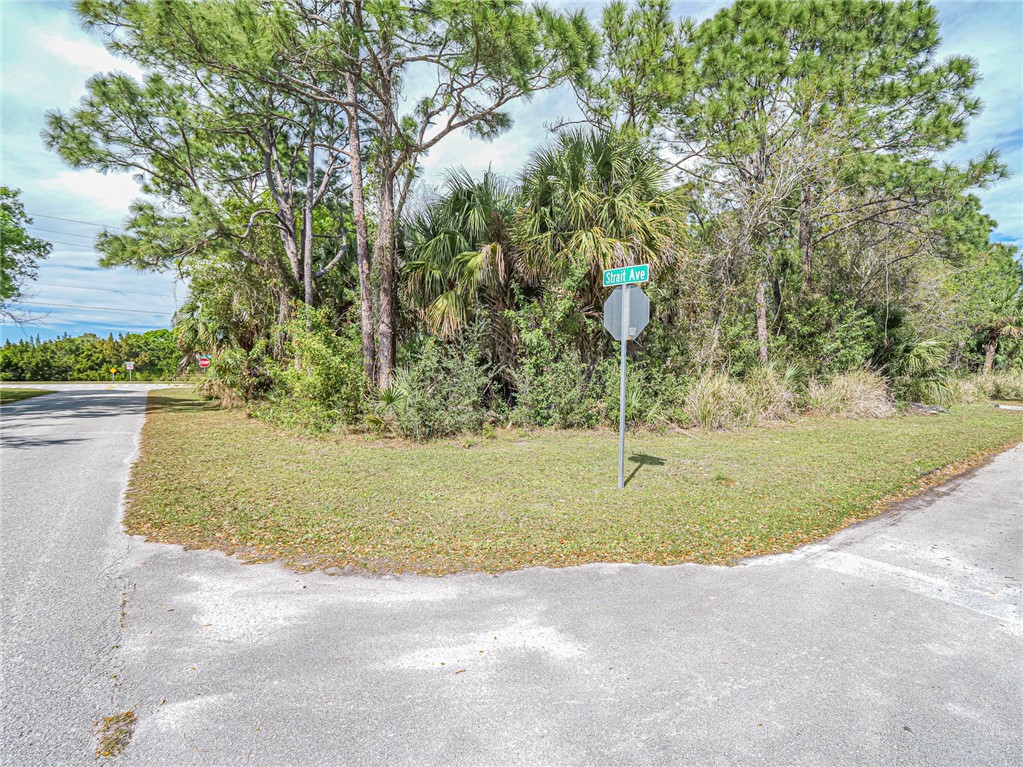 789 Sebastian Boulevard Sebastian, FL 32958 - Photo 11 of 14 a view of a yard with large trees
