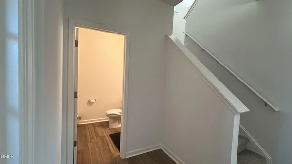 a bathroom with a toilet and a sink