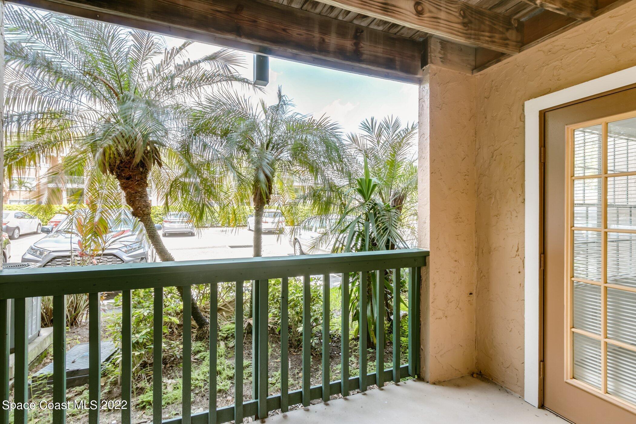 7667 North Wickham Road, Unit 703 Melbourne, FL 32940 - Photo 11 of 40 a view of a porch