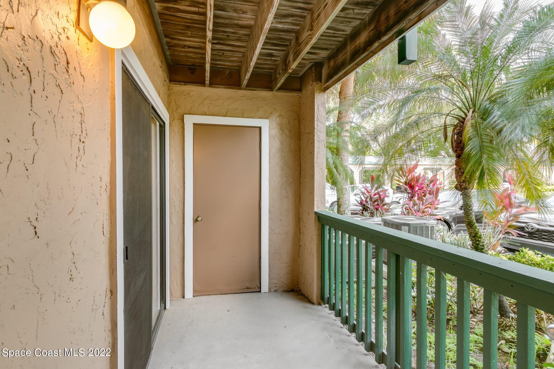 7667 North Wickham Road, Unit 703 Melbourne, FL 32940 - Photo 12 of 40 a view of a balcony