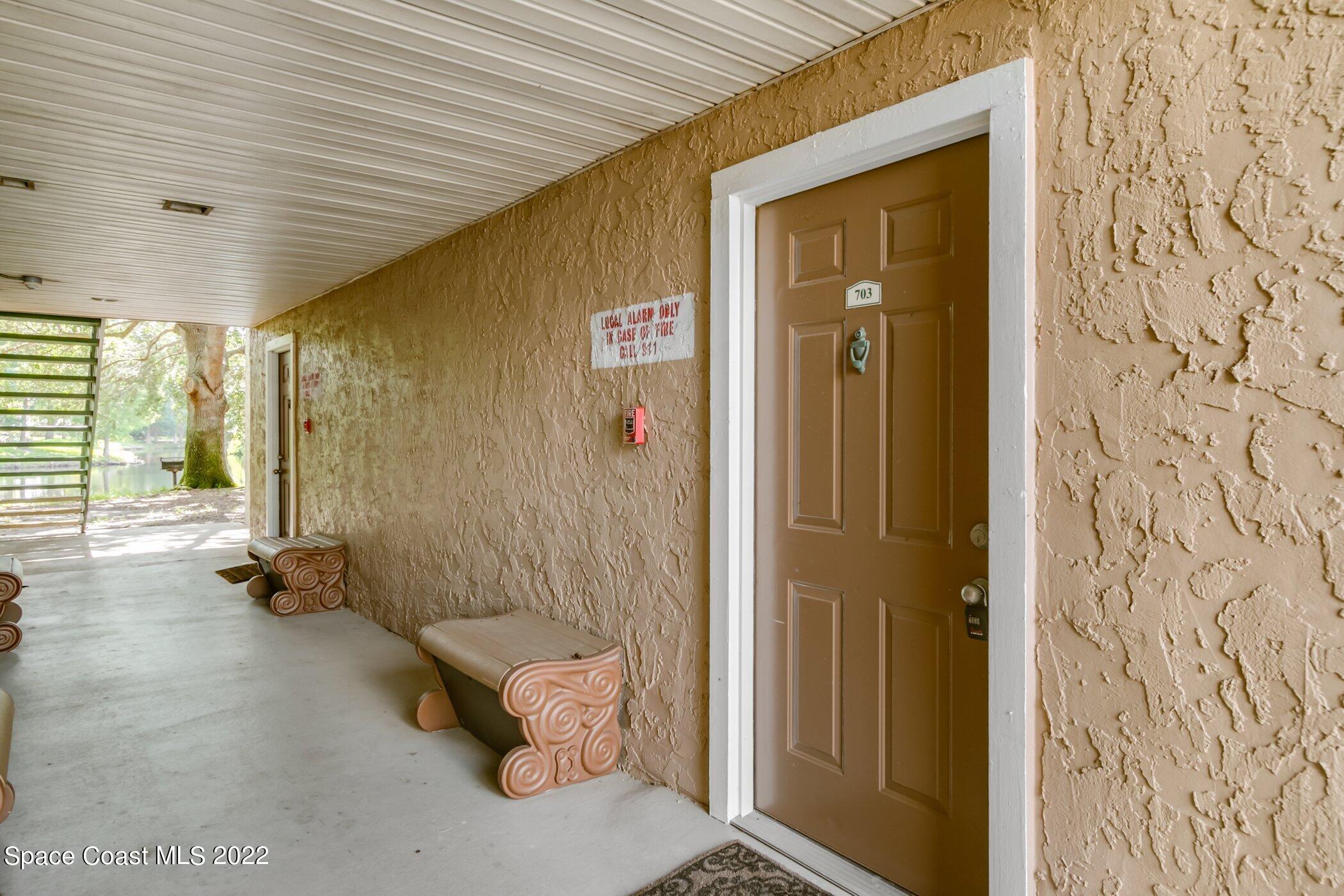 7667 North Wickham Road, Unit 703 Melbourne, FL 32940 - Photo 2 of 40 a bathroom with a tub and shower