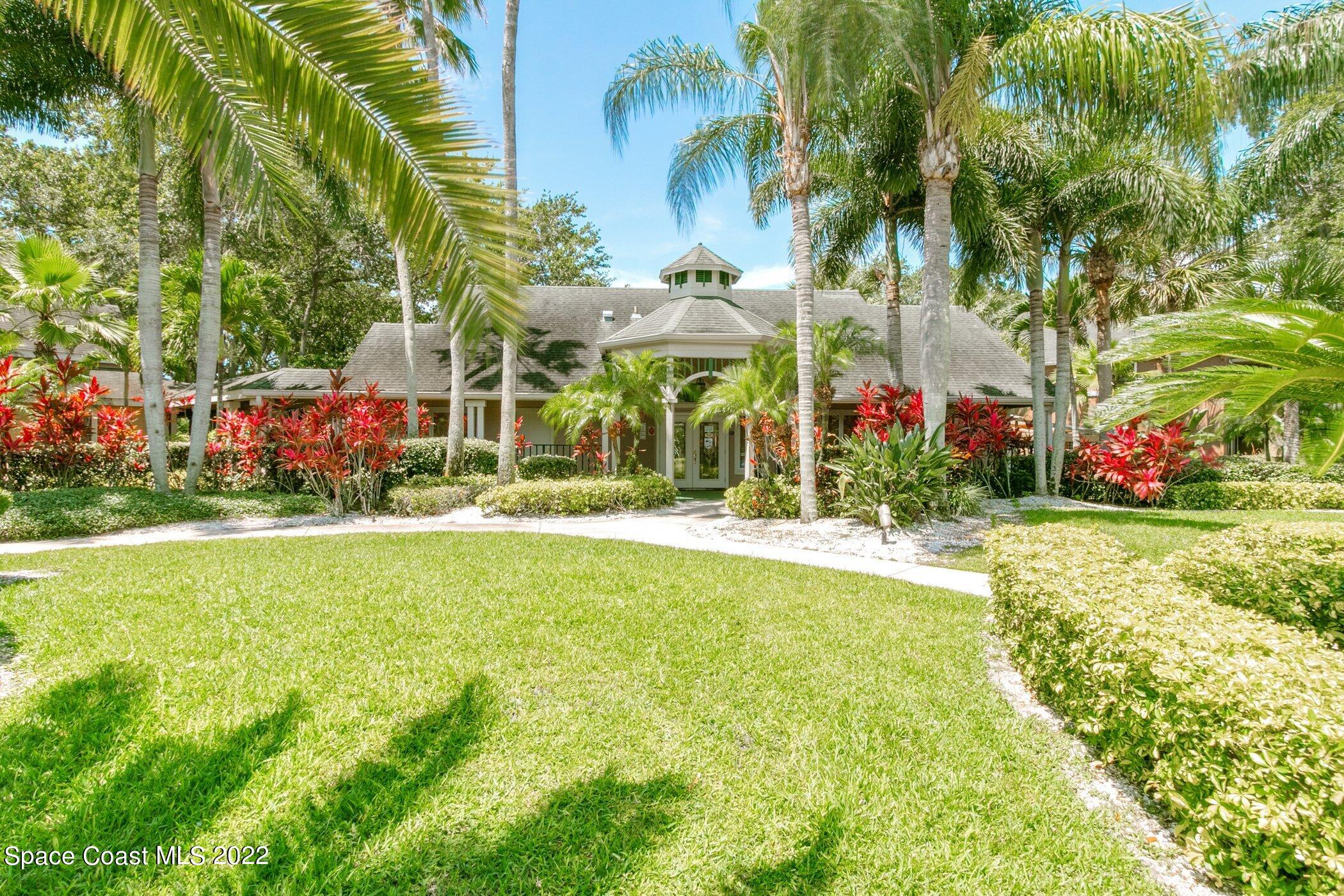 7667 North Wickham Road, Unit 703 Melbourne, FL 32940 - Photo 36 of 40 a view of outdoor space yard and tree
