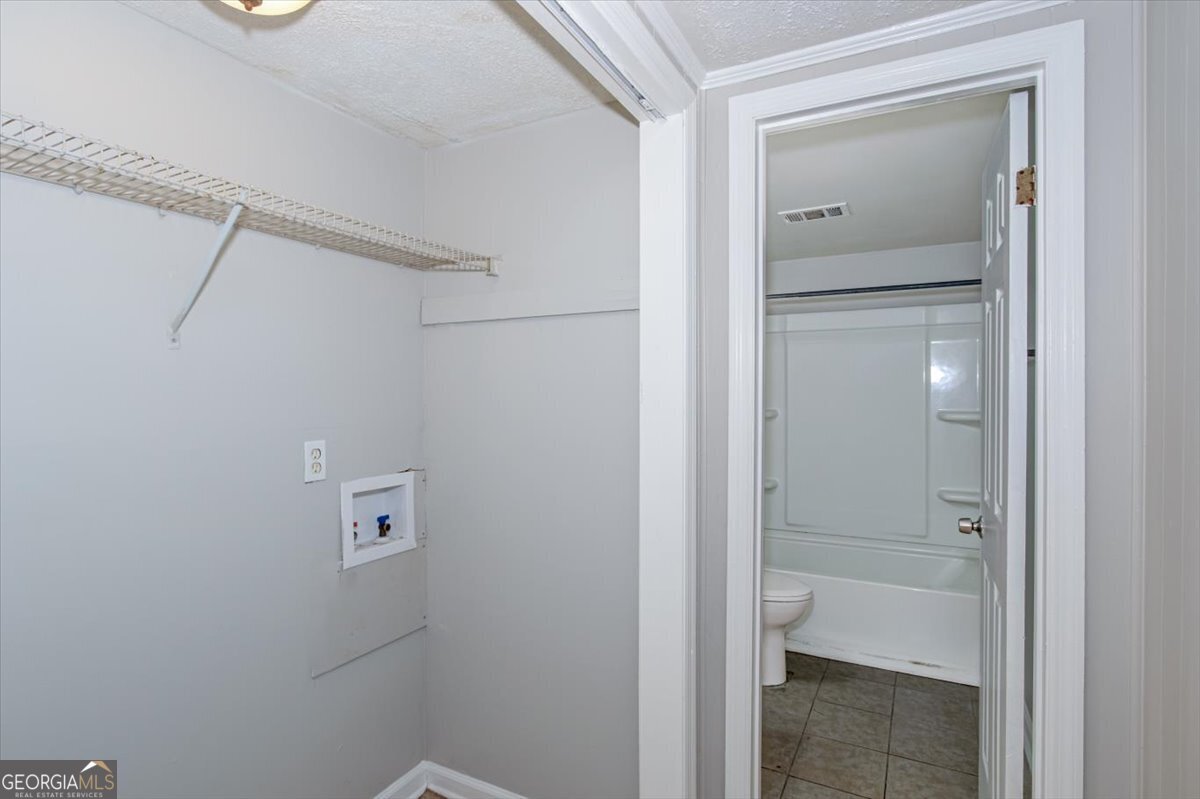 1232 12th Street, Unit D Augusta, GA 30901 - Photo 13 of 27 a view of bathroom