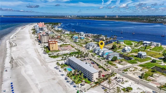a view of a swimming pool with chairs