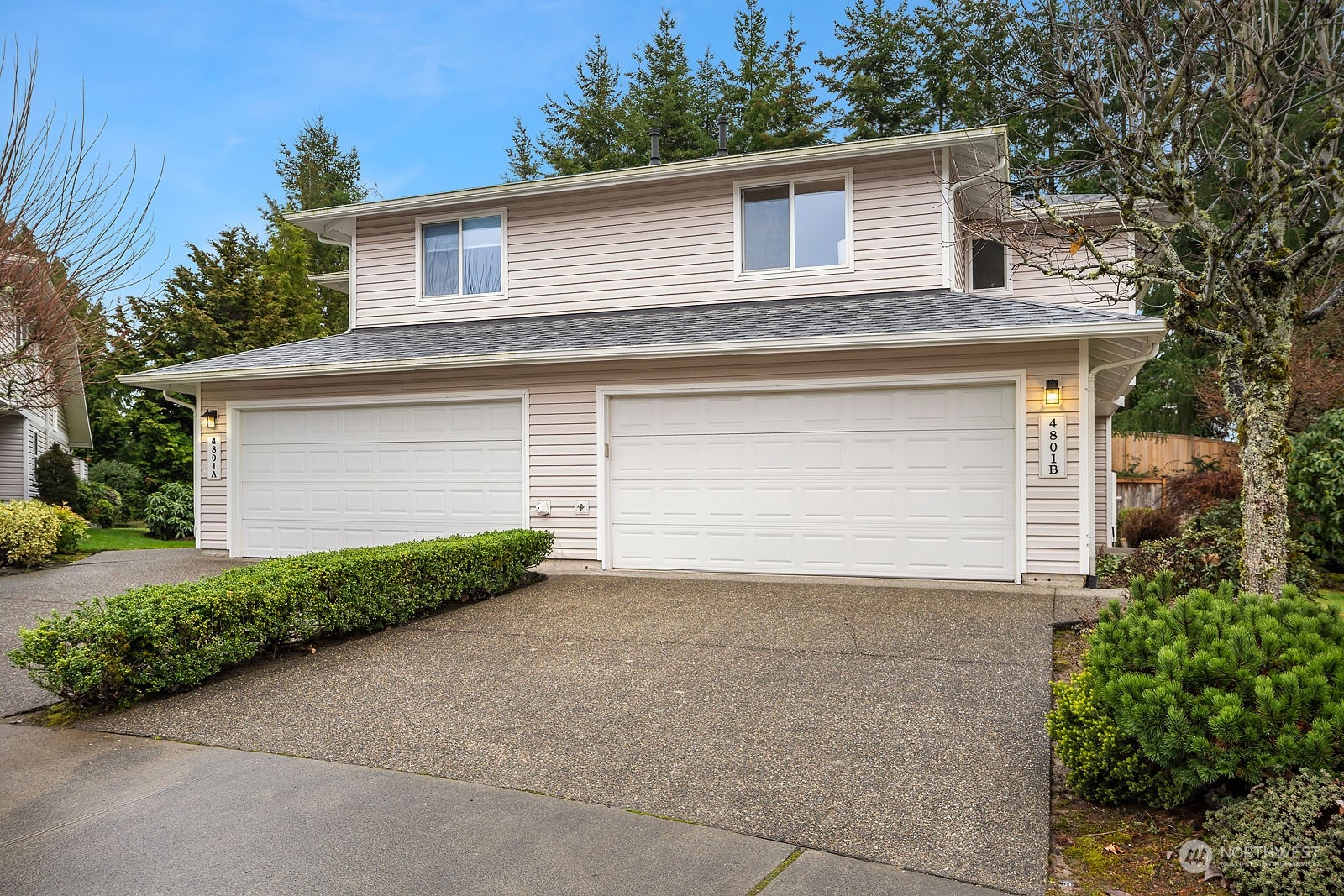 4801 Northeast 18th Place, Unit B Renton, WA 98059 - Photo 1 of 36 a view of backyard of house garage