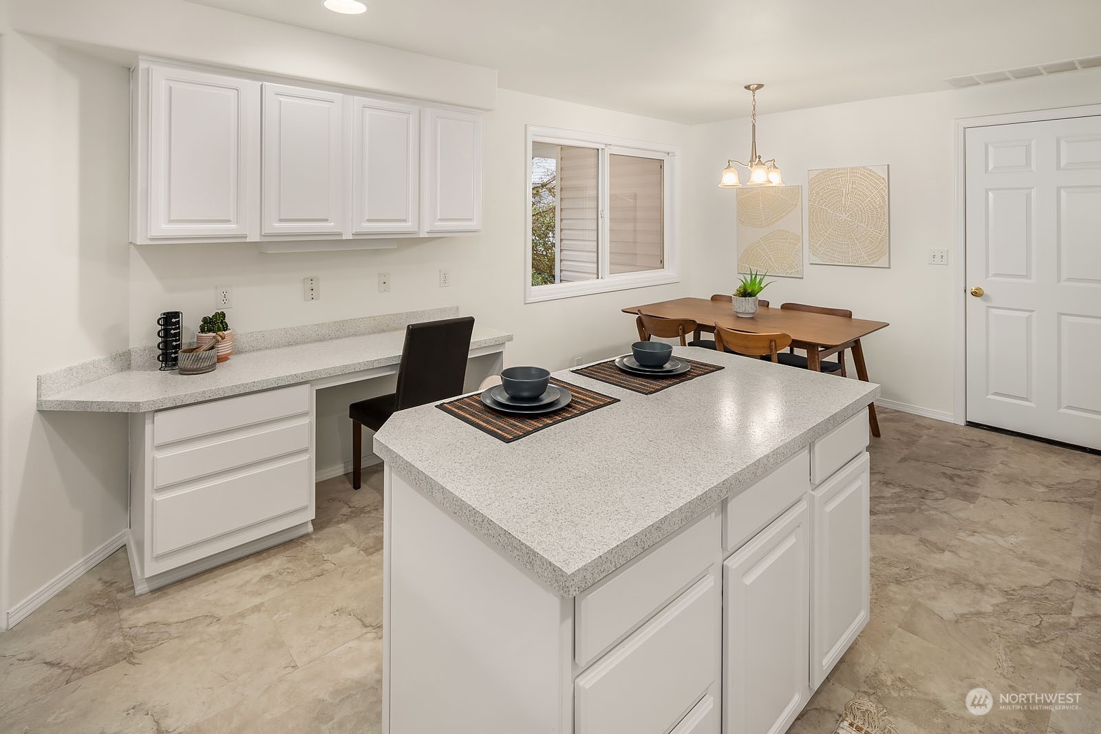 4801 Northeast 18th Place, Unit B Renton, WA 98059 - Photo 12 of 36 a kitchen with a stove cabinets and wooden floor