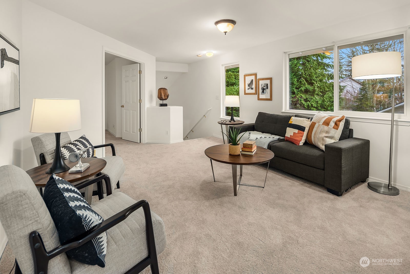 4801 Northeast 18th Place, Unit B Renton, WA 98059 - Photo 20 of 36 a living room with furniture and a large window