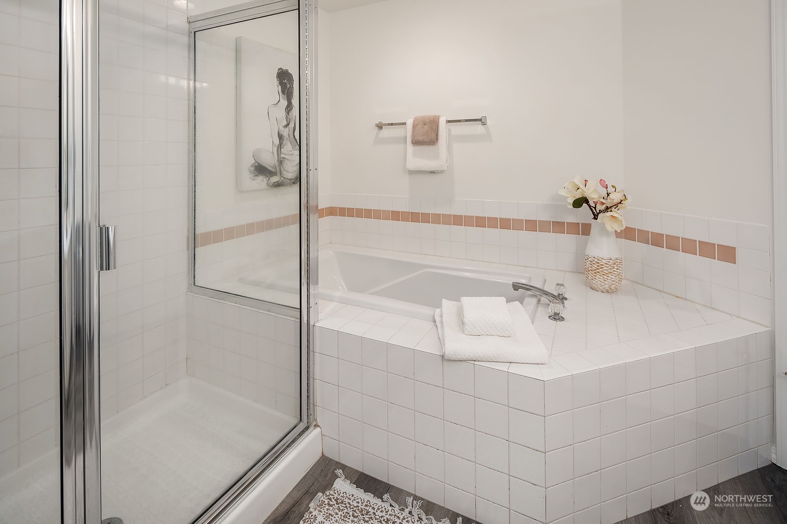 4801 Northeast 18th Place, Unit B Renton, WA 98059 - Photo 23 of 36 a bathroom with a sink and shower