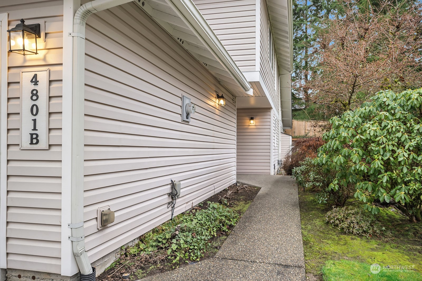 4801 Northeast 18th Place, Unit B Renton, WA 98059 - Photo 3 of 36 a view of a back yard of the house