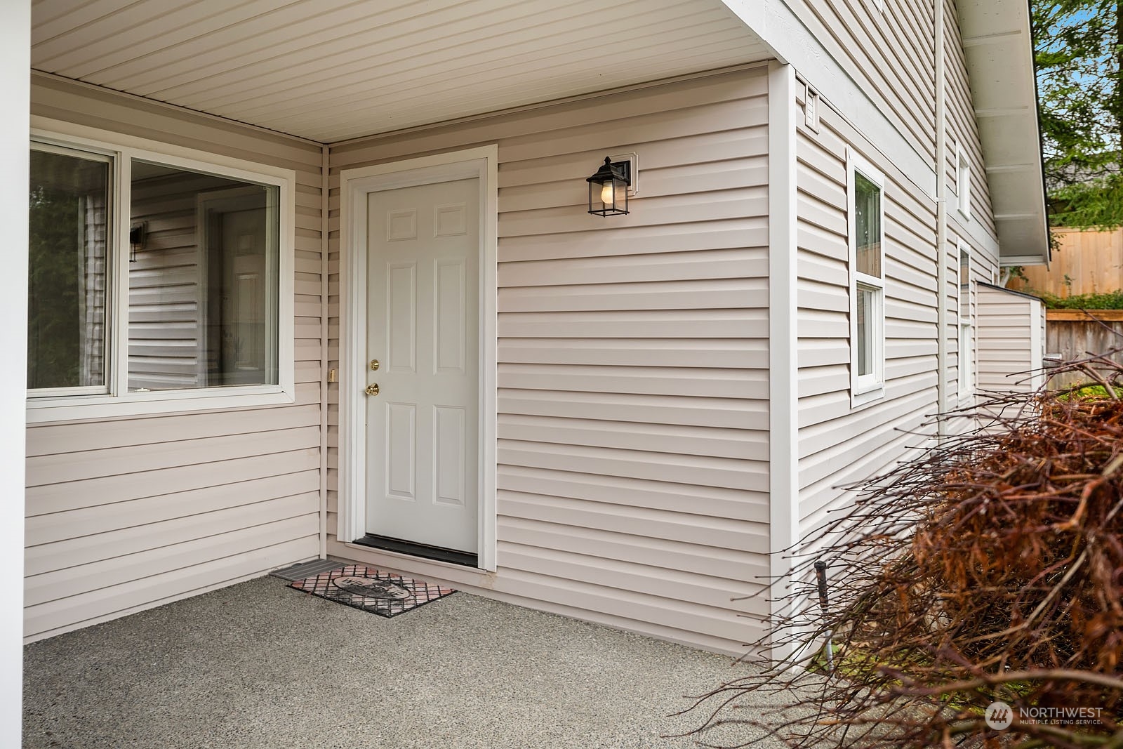 4801 Northeast 18th Place, Unit B Renton, WA 98059 - Photo 4 of 36 a view of a house with a garage