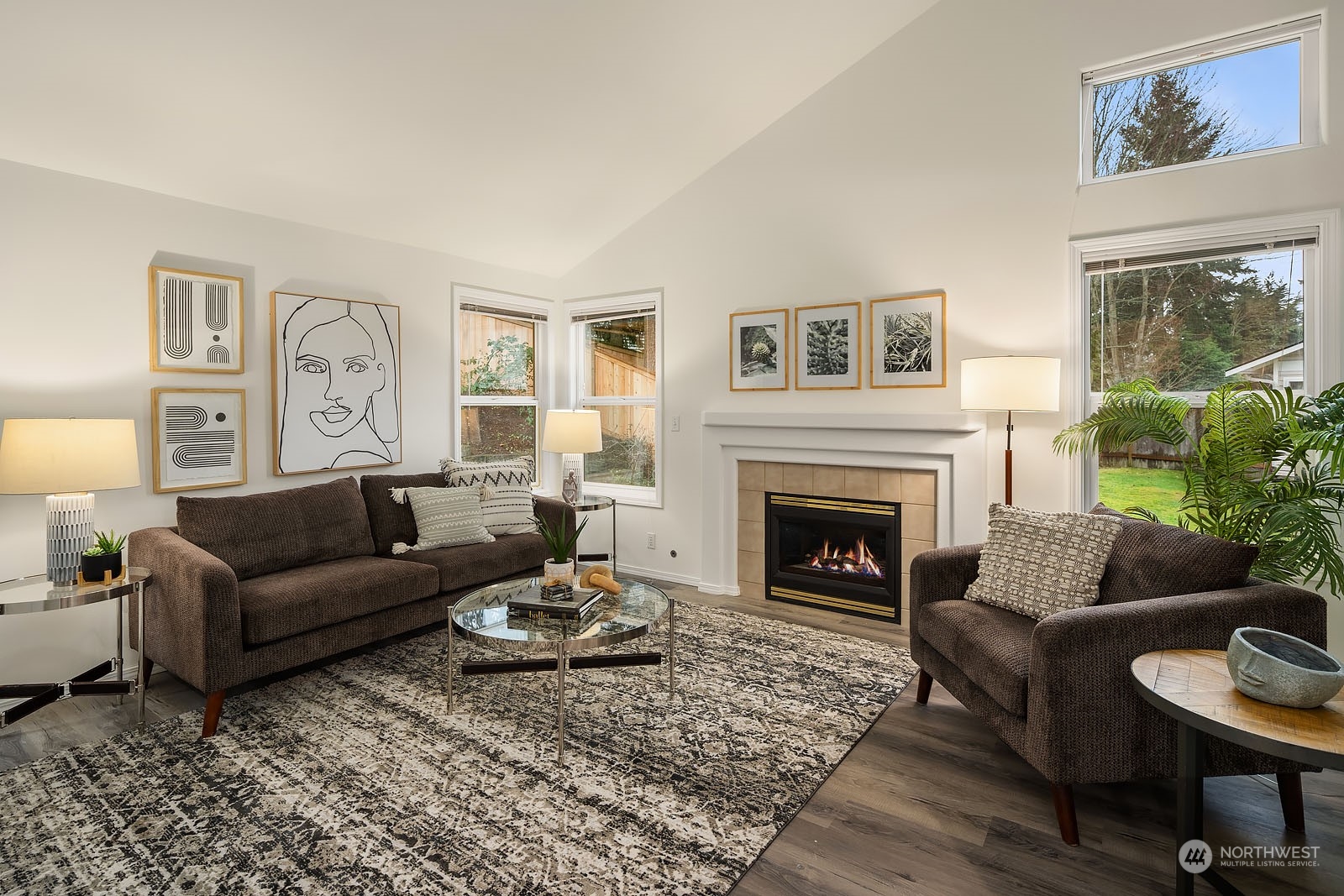 4801 Northeast 18th Place, Unit B Renton, WA 98059 - Photo 5 of 36 a living room with furniture and a fireplace