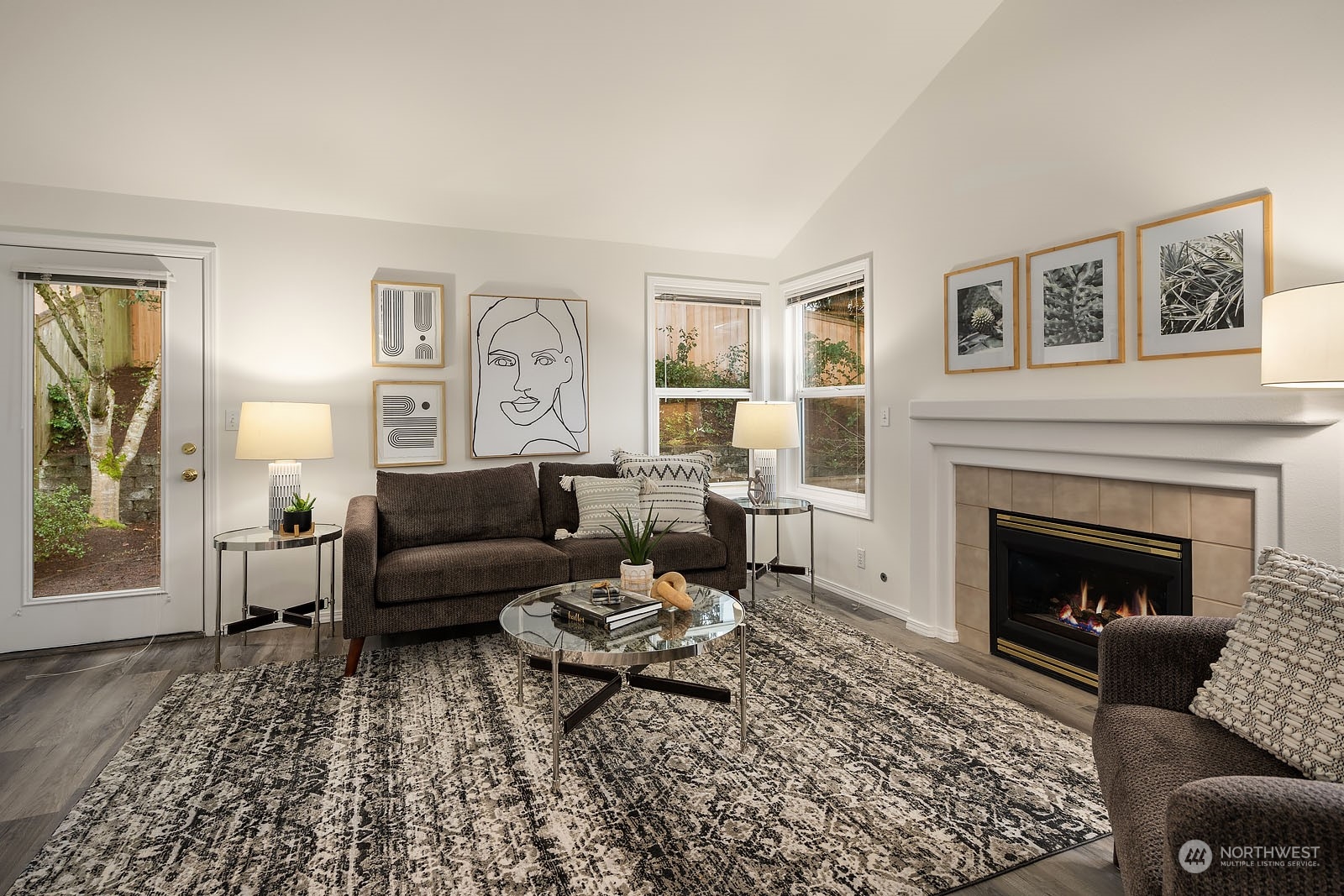 4801 Northeast 18th Place, Unit B Renton, WA 98059 - Photo 6 of 36 a living room with furniture and a fireplace