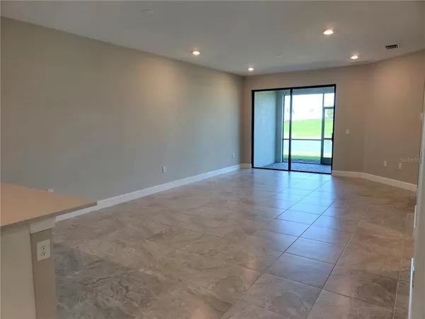 a view of a room that has a door in it