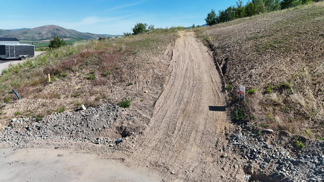 1398 Mogul Lane, Unit 1 Inkom, ID 83245 - Photo 30 of 33 Expansive undeveloped lot featuring a natural terrain slope and a partial dirt access path
