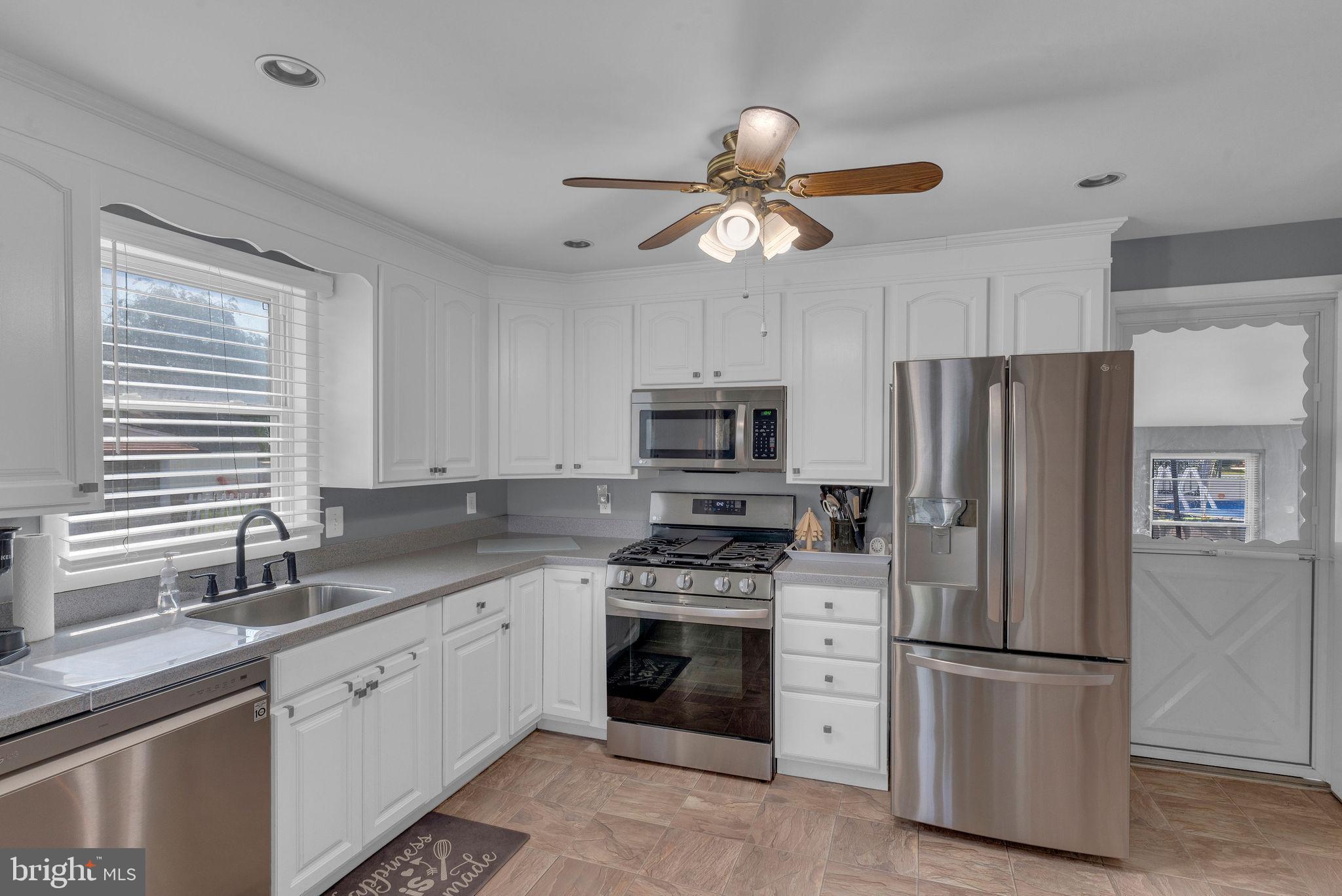 15 Bolton Road Hamilton, NJ 08610 - Photo 8 of 32 Modern kitchen with stainless steel appliances.
