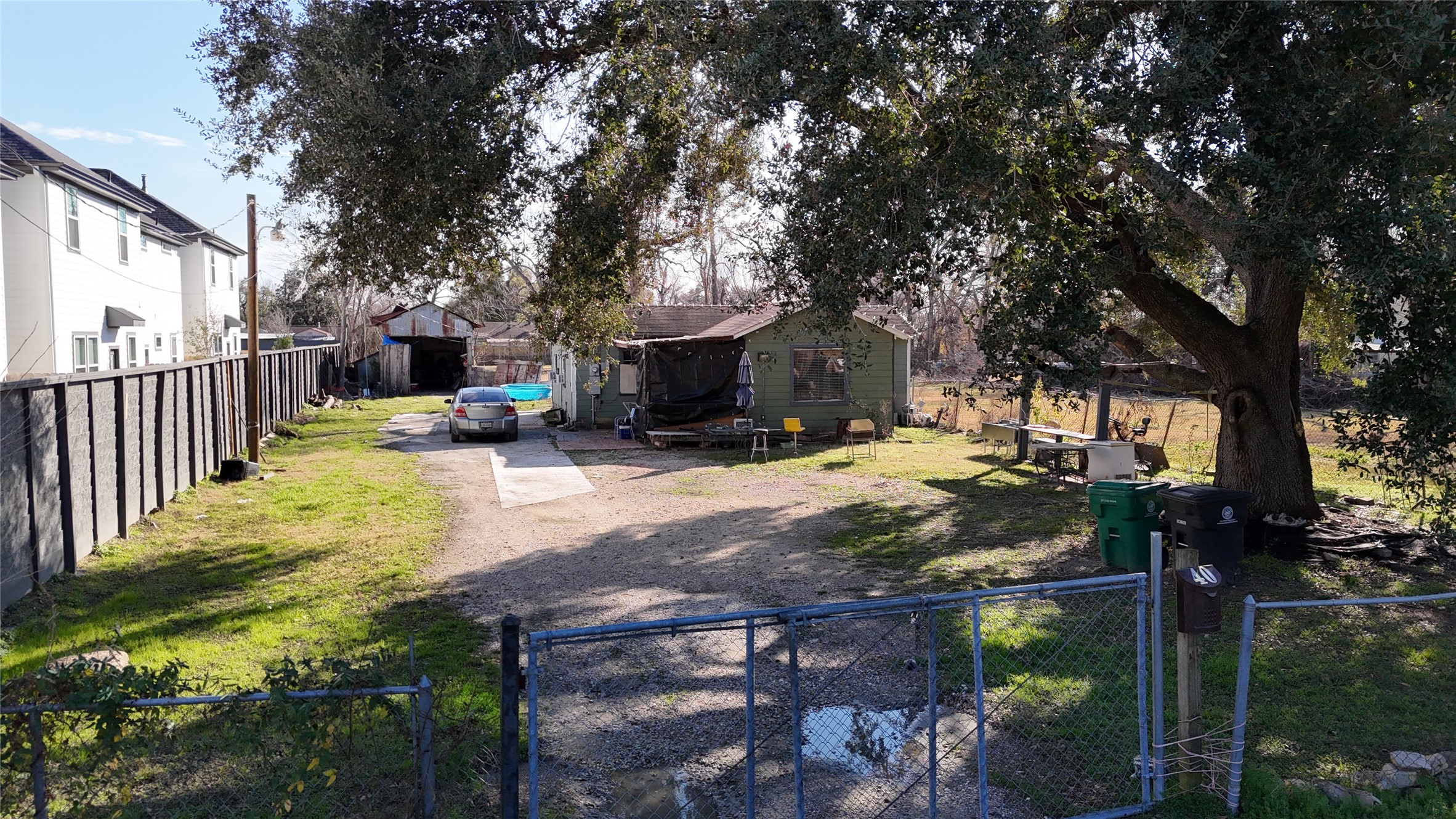 40 Dipping Lane Houston, TX 77076 - Photo 13 of 17 a view of a yard with plants and a tree