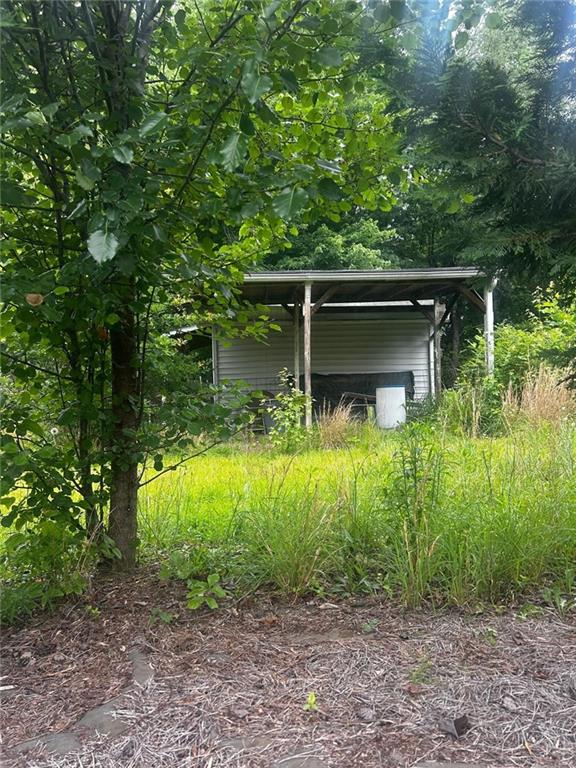 a view of outdoor space and yard