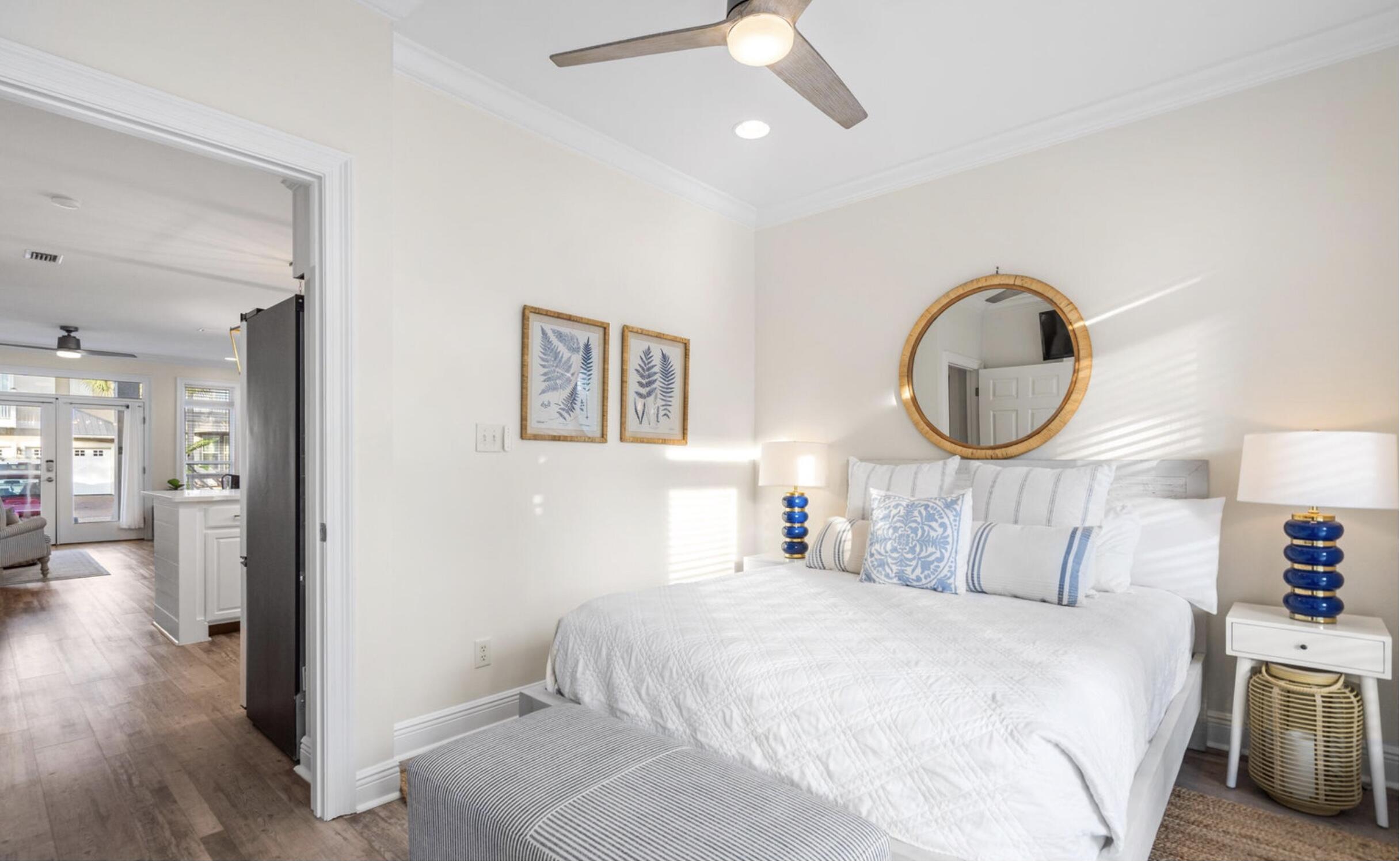 61 West Seacrest Beach Blvd Inlet Beach Inlet Beach, FL 32461 - Photo 13 of 47 a bedroom with a bed mirror and a large mirror