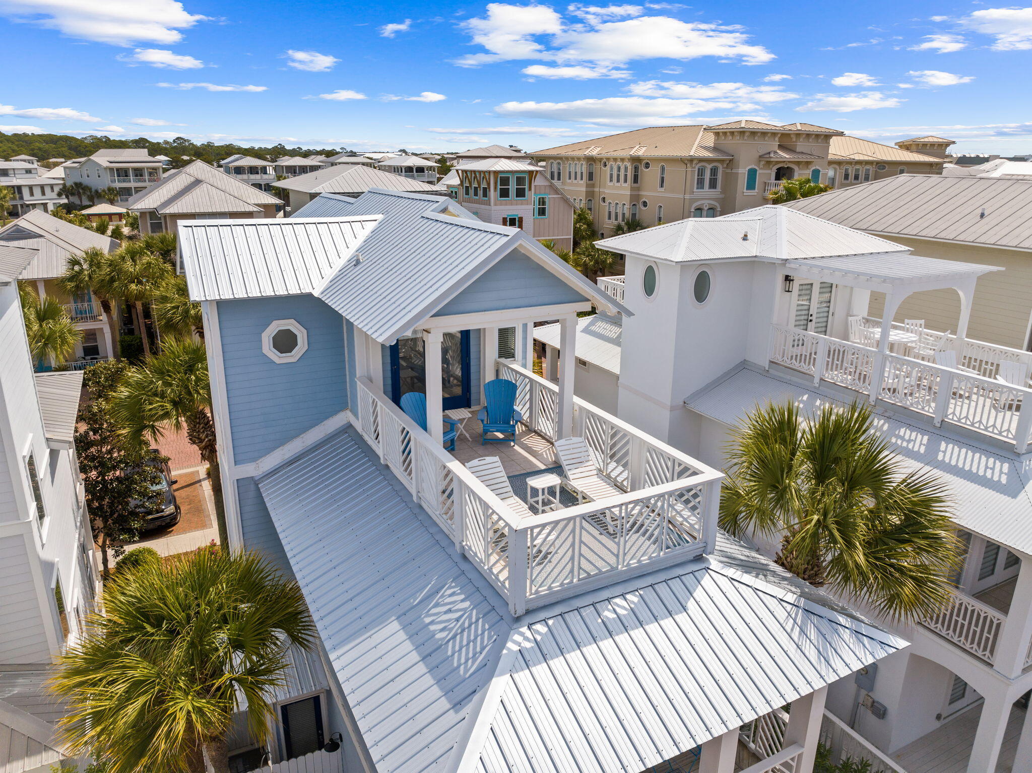 61 West Seacrest Beach Blvd Inlet Beach Inlet Beach, FL 32461 - Photo 20 of 47 a view of a house with pool and chairs