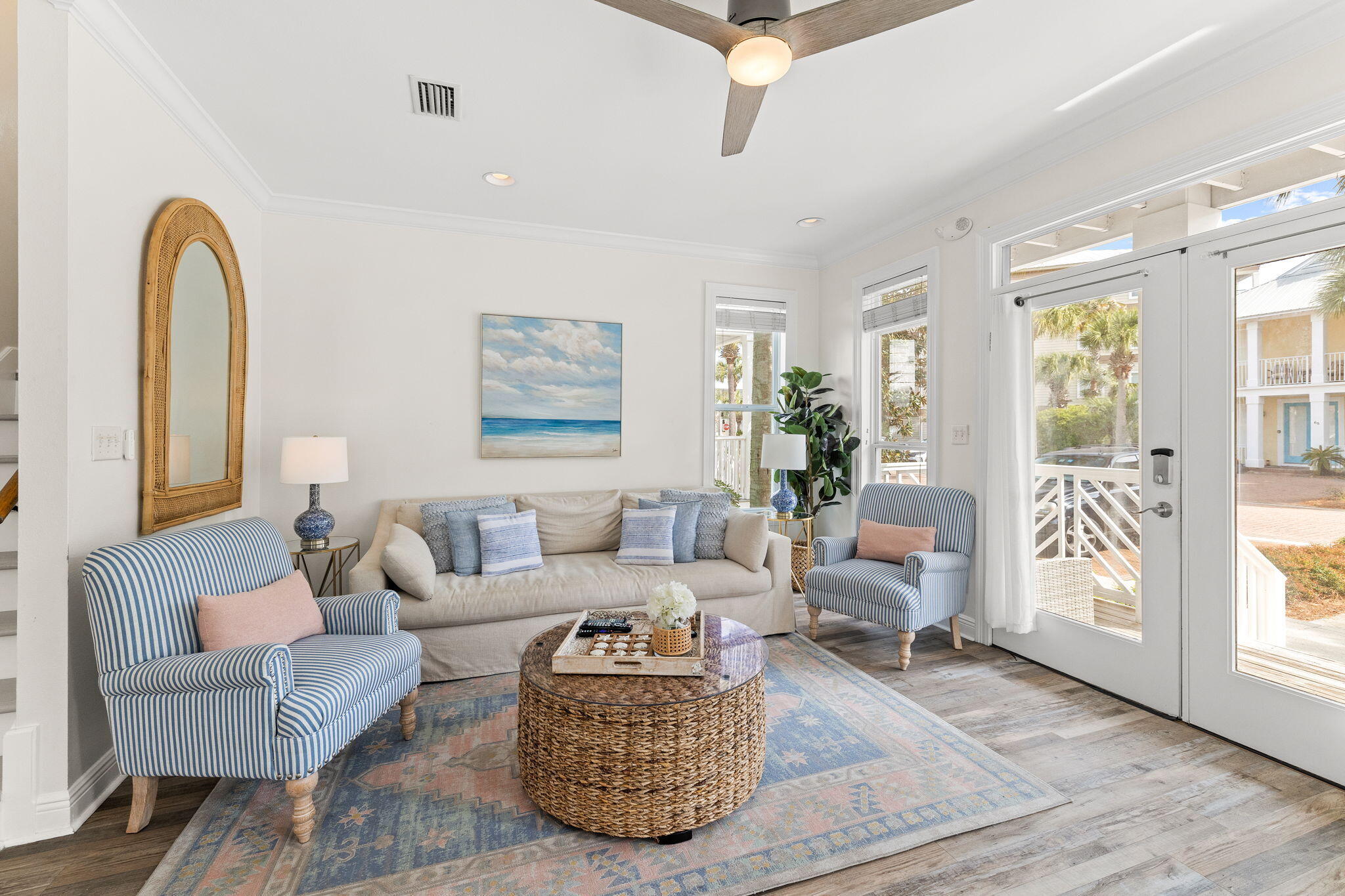61 West Seacrest Beach Blvd Inlet Beach Inlet Beach, FL 32461 - Photo 23 of 47 a living room with furniture and a large window
