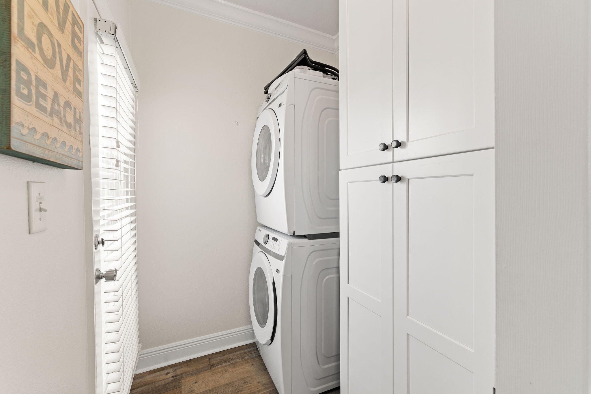 61 West Seacrest Beach Blvd Inlet Beach Inlet Beach, FL 32461 - Photo 24 of 47 a utility room with dryer and washer