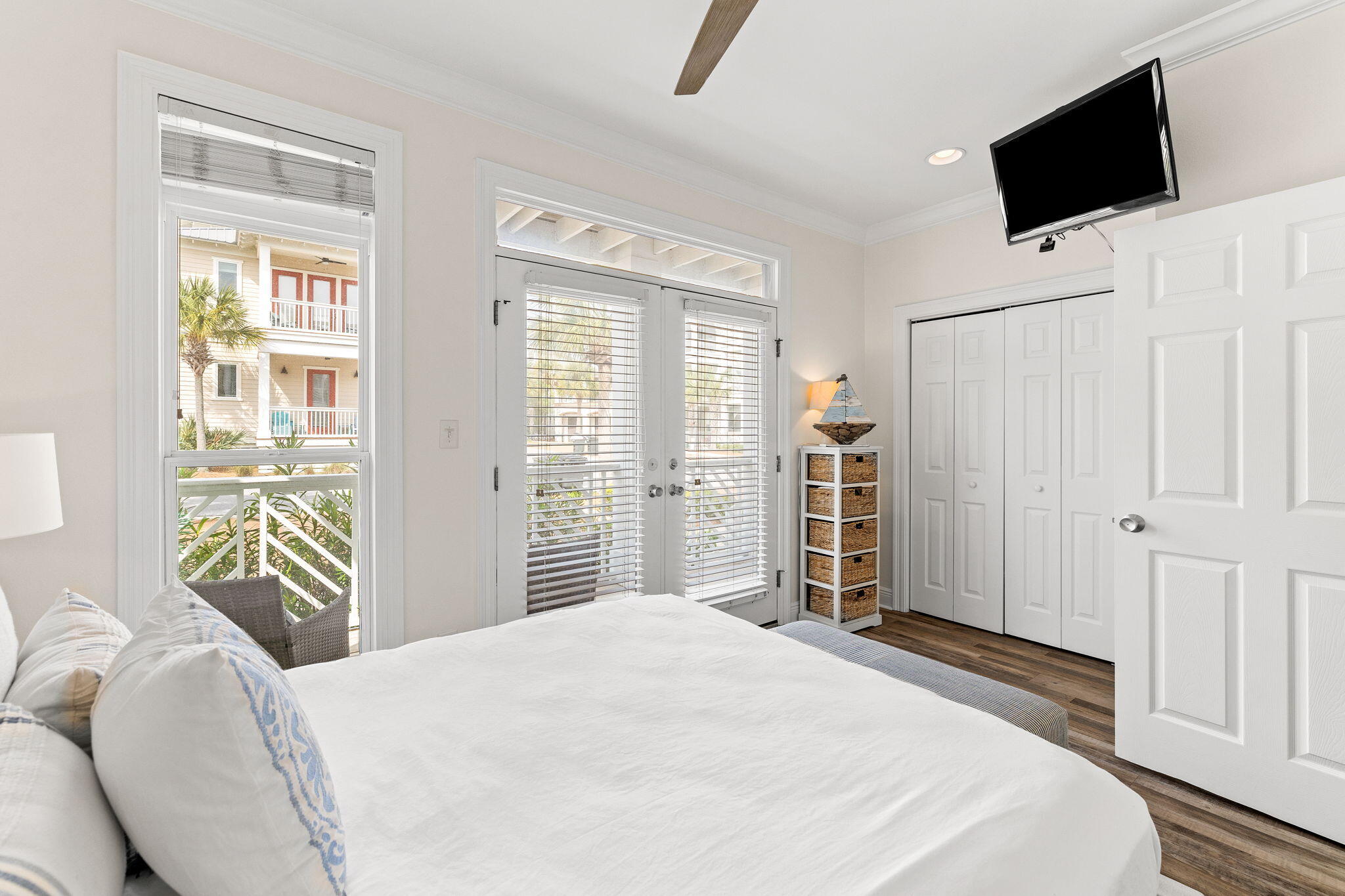 61 West Seacrest Beach Blvd Inlet Beach Inlet Beach, FL 32461 - Photo 26 of 47 a bedroom with a bed tv and a window