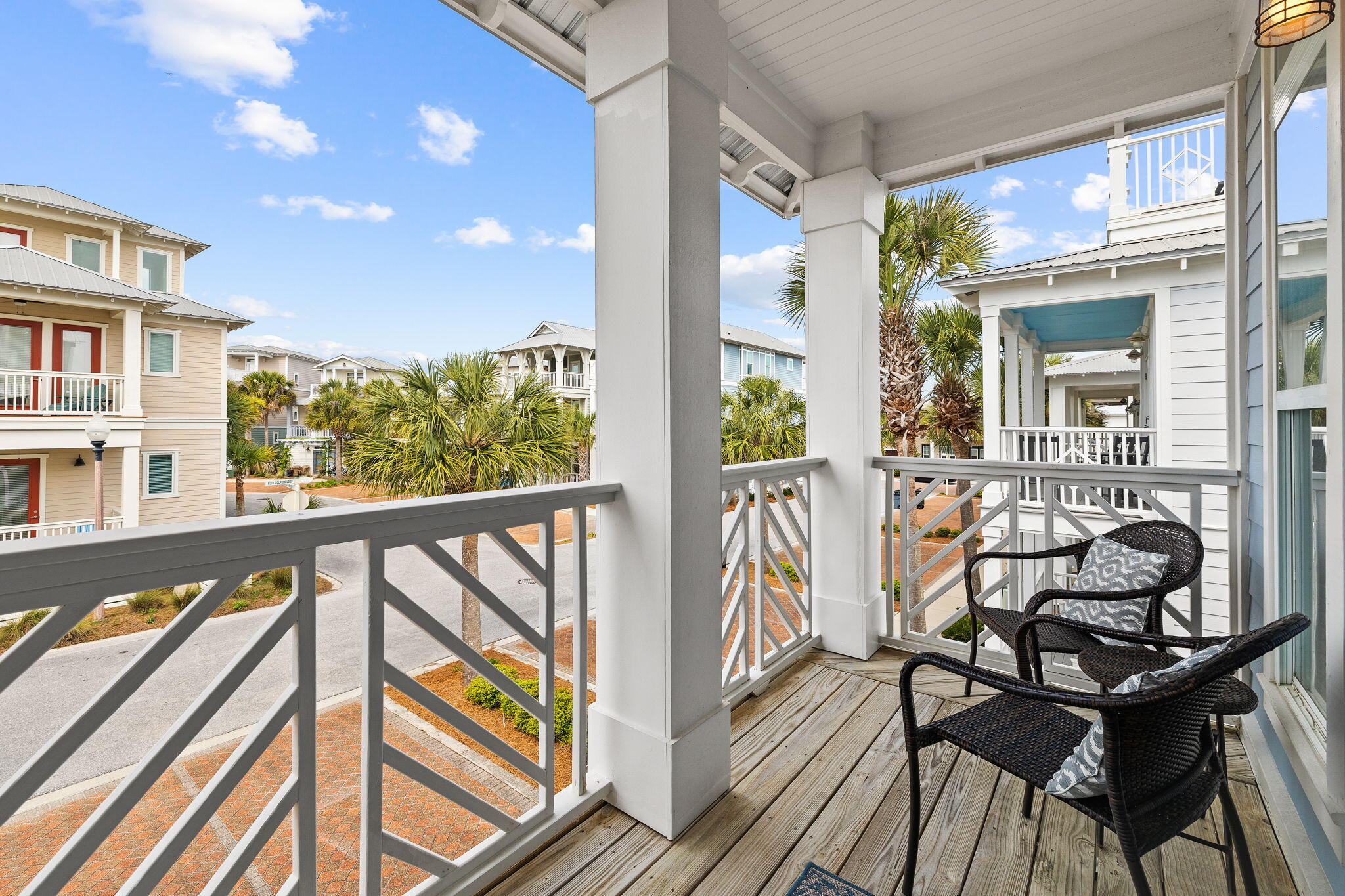 61 West Seacrest Beach Blvd Inlet Beach Inlet Beach, FL 32461 - Photo 34 of 47 a view of a balcony with chairs