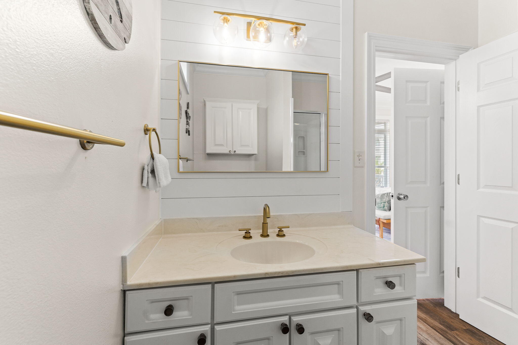 61 West Seacrest Beach Blvd Inlet Beach Inlet Beach, FL 32461 - Photo 36 of 47 a bathroom with a sink and a mirror