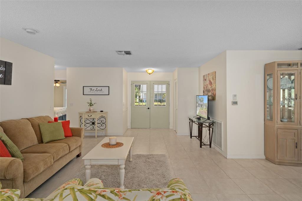 6147 Turnburry Court Spring Hill, FL 34606 - Photo 11 of 31 a living room with furniture and a couch