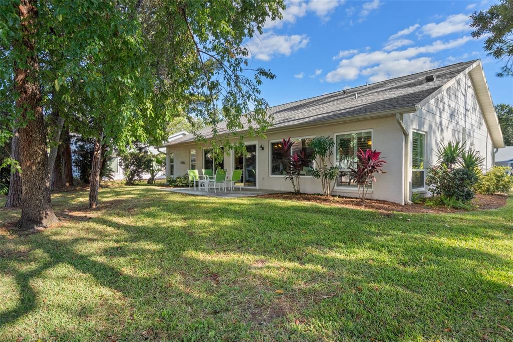 6147 Turnburry Court Spring Hill, FL 34606 - Photo 29 of 31 a view of outdoor space yard and porch
