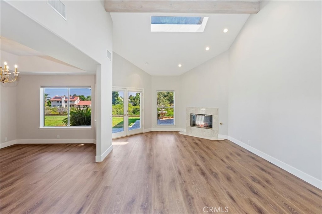 1507 Weston Way Riverside, CA 92506 - Photo 11 of 55 wooden floor in an empty room with a window