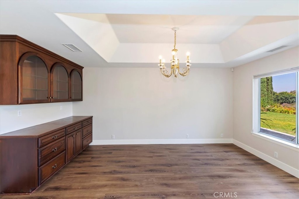 1507 Weston Way Riverside, CA 92506 - Photo 14 of 55 a room with wooden floor and window