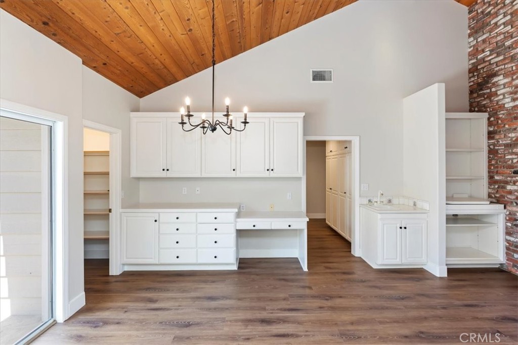 1507 Weston Way Riverside, CA 92506 - Photo 20 of 55 a view of an empty room with wooden floor