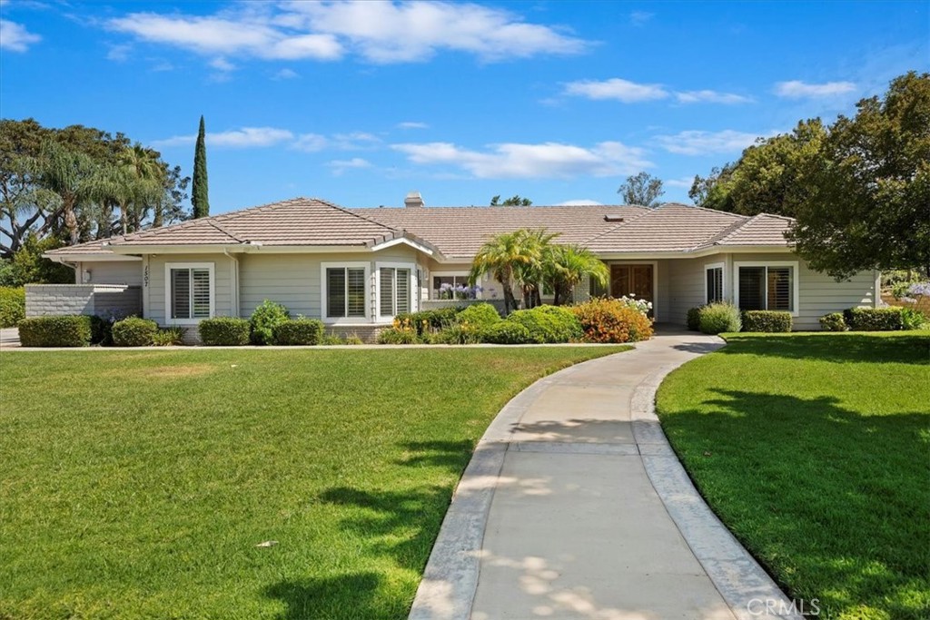 1507 Weston Way Riverside, CA 92506 - Photo 2 of 55 a front view of a house with a yard