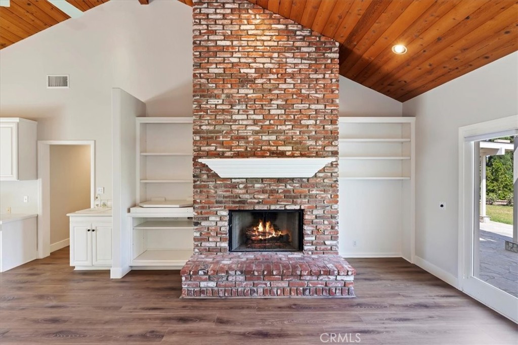 1507 Weston Way Riverside, CA 92506 - Photo 24 of 55 a living room with a fireplace