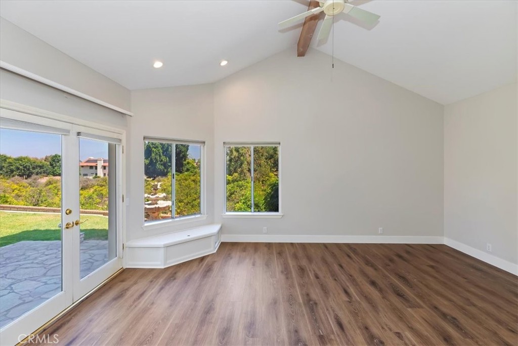1507 Weston Way Riverside, CA 92506 - Photo 35 of 55 wooden floor in an empty room with a window