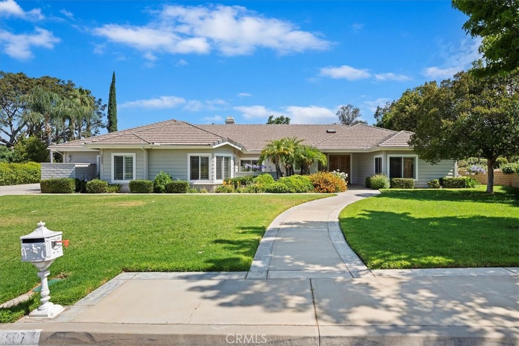 1507 Weston Way Riverside, CA 92506 - Photo 4 of 55 a front view of a house with a yard
