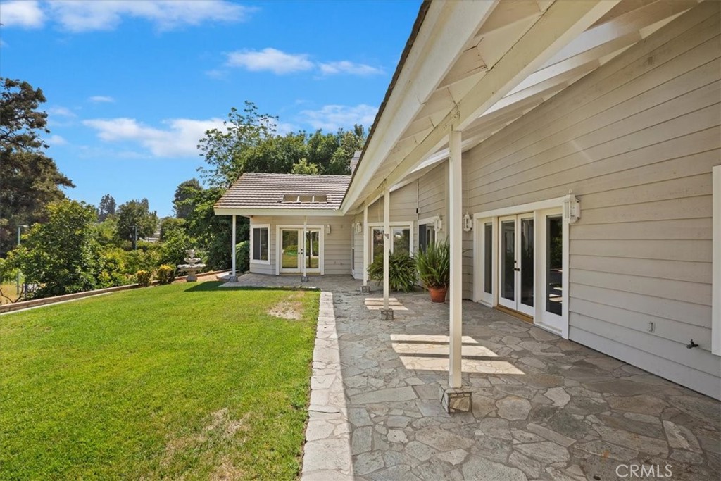 1507 Weston Way Riverside, CA 92506 - Photo 48 of 55 a view of a house with backyard porch and sitting area
