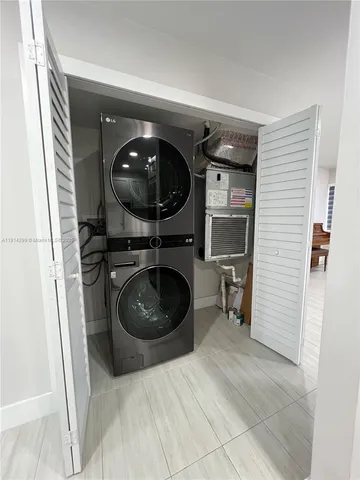 a utility room with a washer and dryer