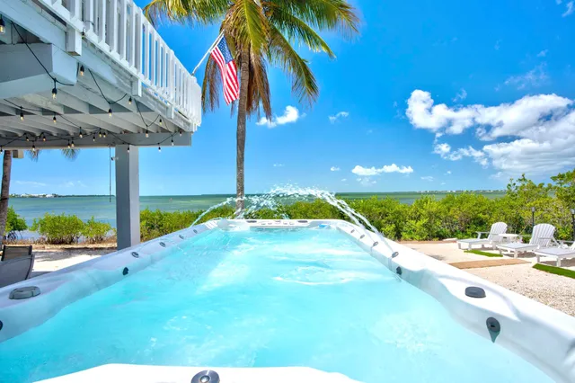 a view of a backyard of the house