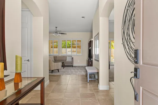 a living room with furniture and a window